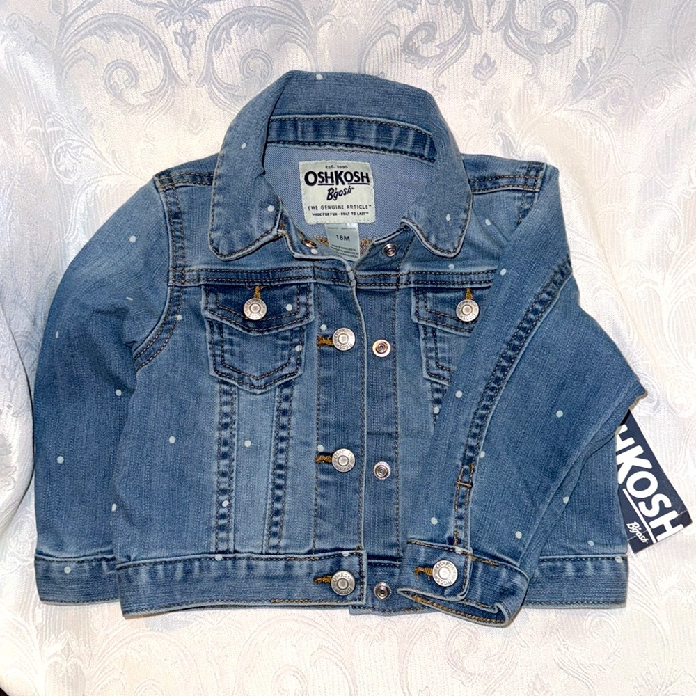 Oshkosh Bgosh Blue Jean Jacket with polkadots has snaps that looks like buttons